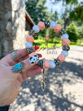 Peachy Opal Leopard Wristlet Rose with Grace LLC
