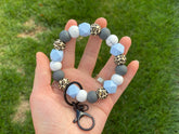 BABY BLUE CHEETAH WRISTLET- SILVER HARDWARE Rose with Grace LLC