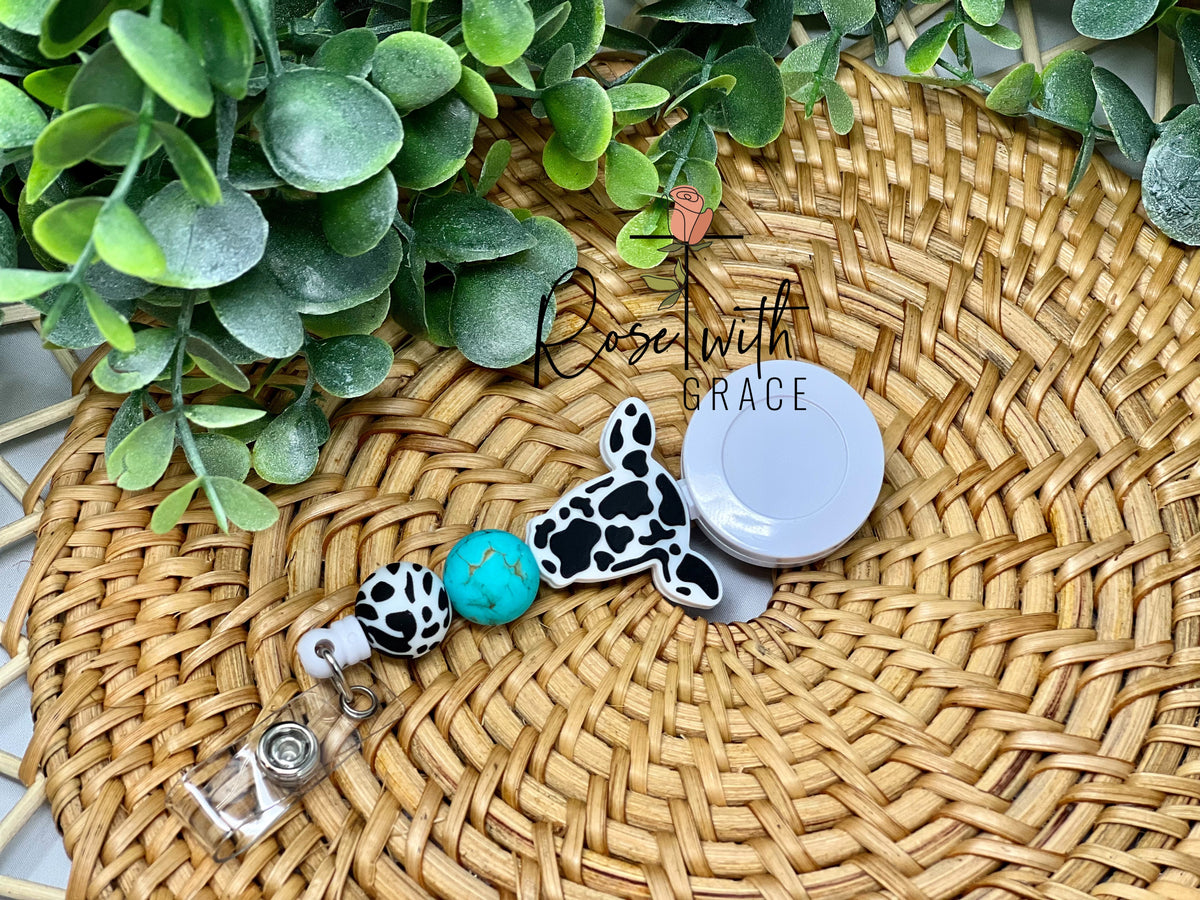 CLASSIC COW TURQUOISE STONE BADGE REEL Rose with Grace LLC